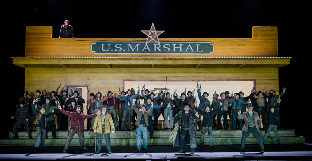 The Girl of the Golden West - Giacomo Puccini - English National OperaDirector - Richard JonesConductor - Keri-Lynn WilsonDesigner - Miriam BuetherCostumes - Nicky GillibrandLighting - Mimi Jordan SherinChoreographer - Lucy BurgeMinnie - Susan Bul